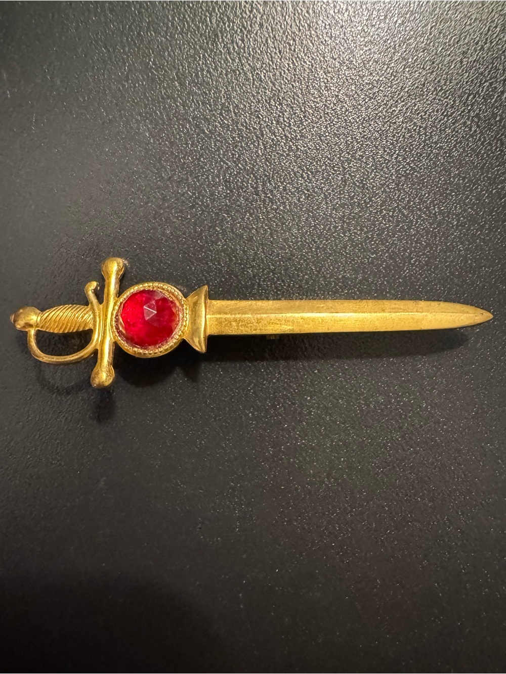 Vintage BROADCAST NYC Gold Tone Sword Brooch Red Paste Stone
